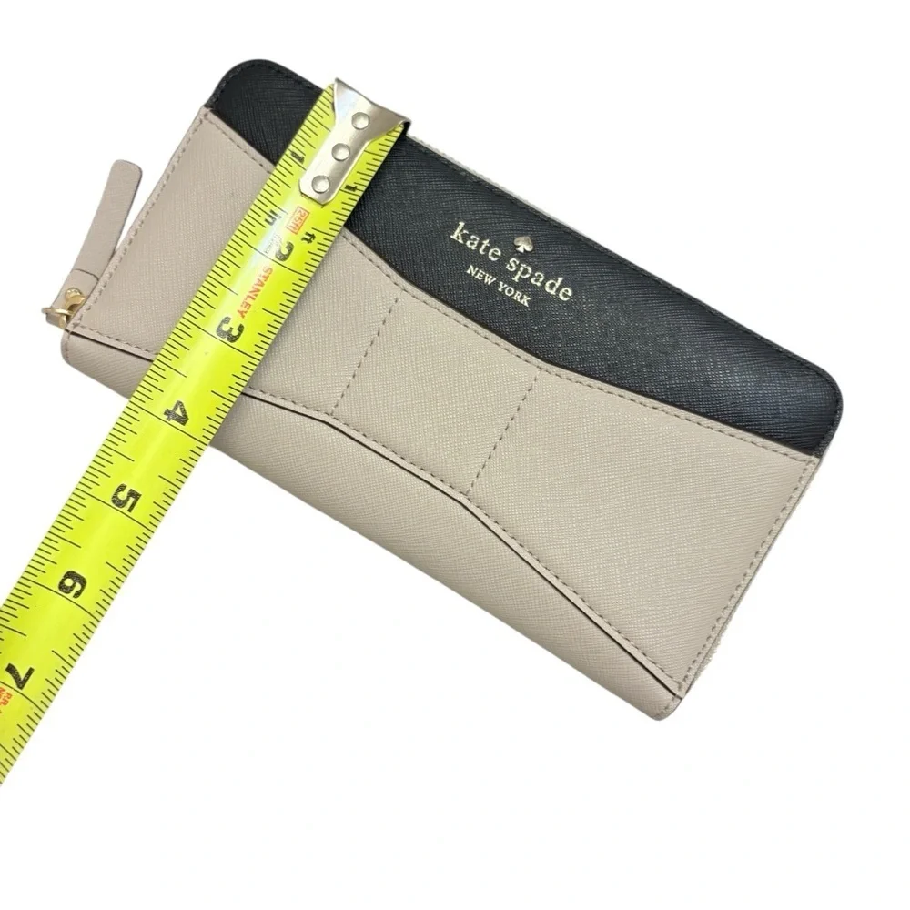 Kate spade cream and black saffiano leather bow wallet color block